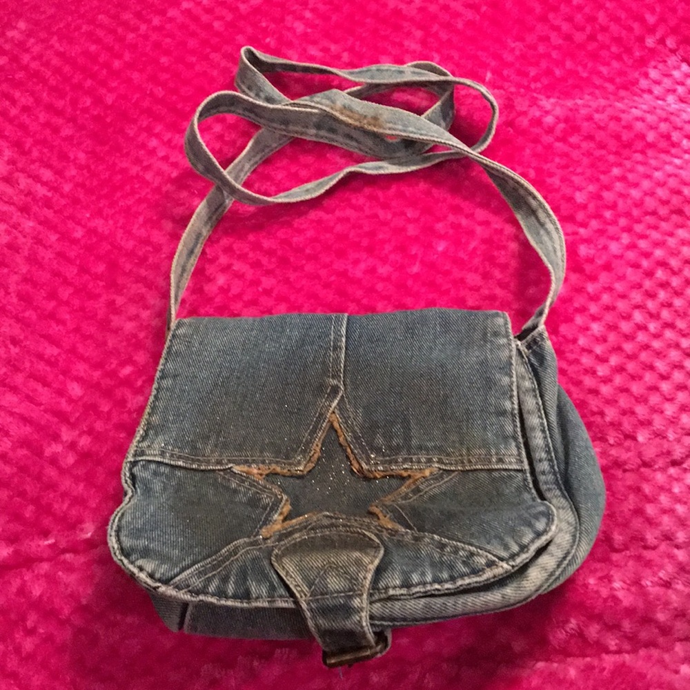 Cute little denim purse with Star. snap closure